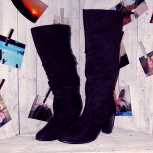 calf high black heeled boots